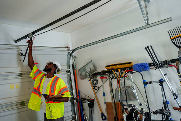 Professional Garage Door Maintenance technician working in Rockville Centre, NY